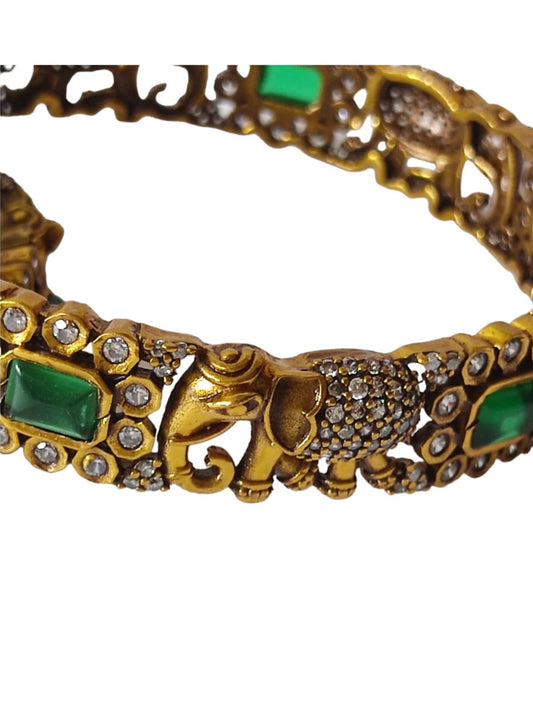 victorian polish bangles with elephant design and green stones