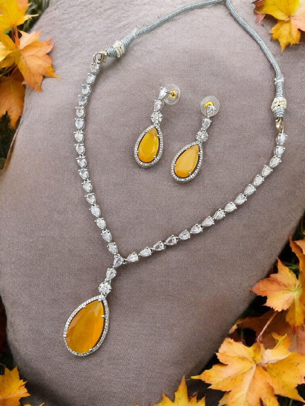deepika padukone oscar necklace . American diamond necklace with yellow stone