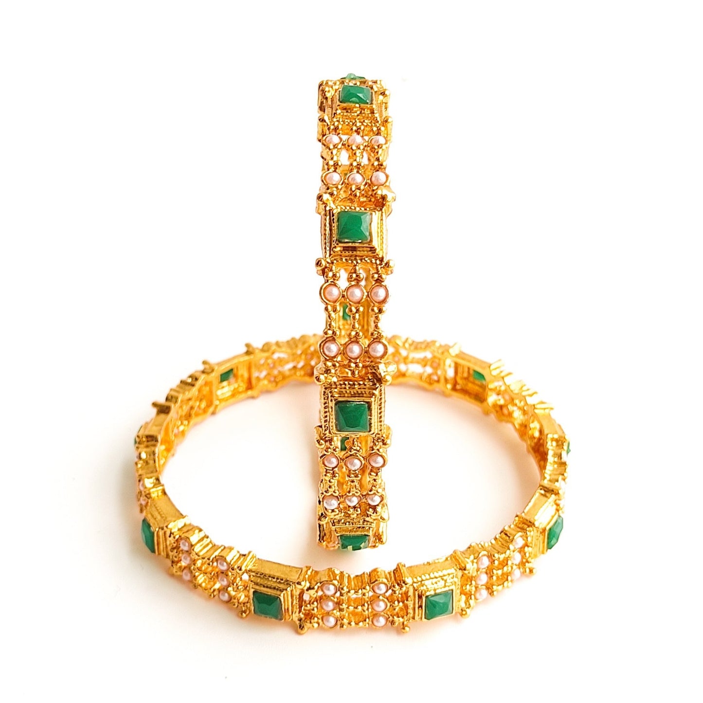 pearl bangles with green stones