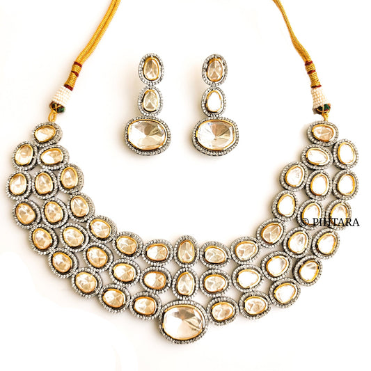 Victorian style dual tone necklace crafted with polki and diamond stones