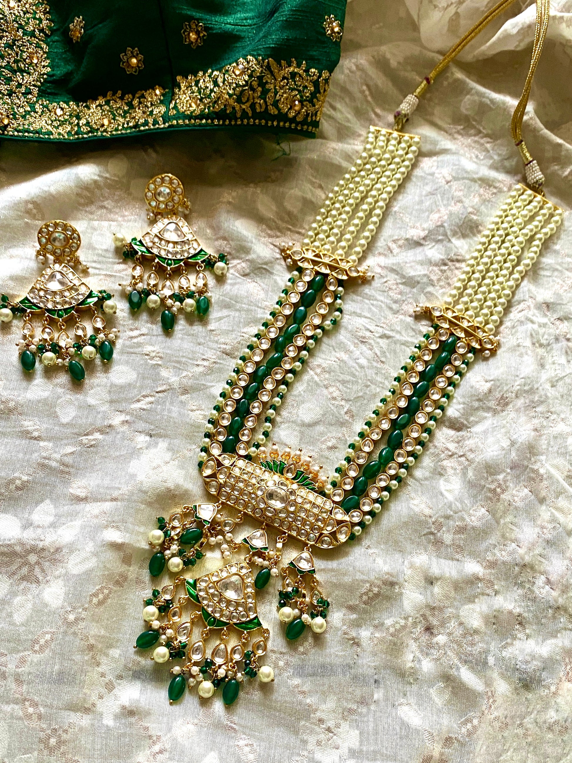Polki kundan long haar set with pearls and green beads