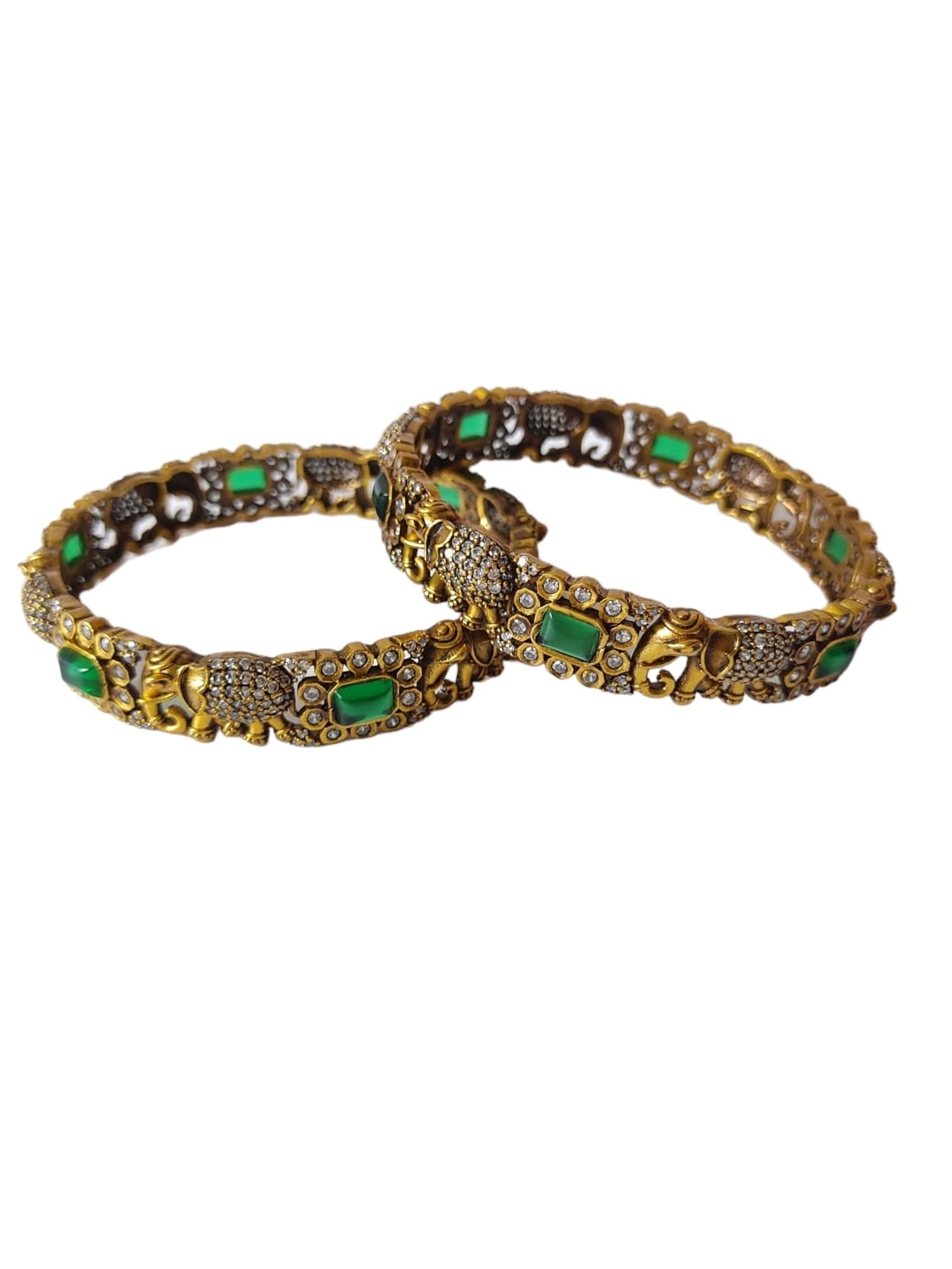 victorian polish bangles with elephant design and green stones