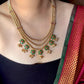 Gold plated layered necklace with green stones