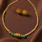 gold plated choker with green beads