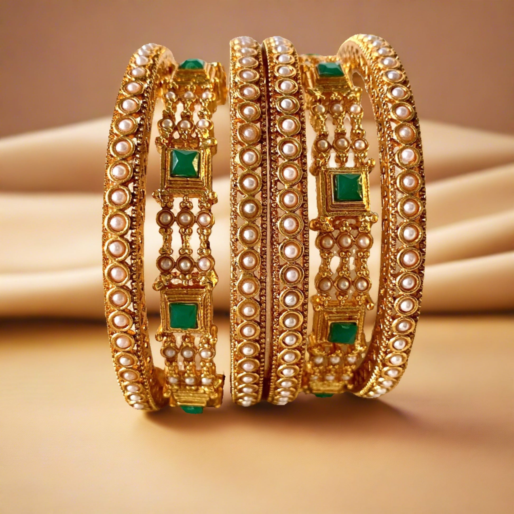 pearl bangles with green stone