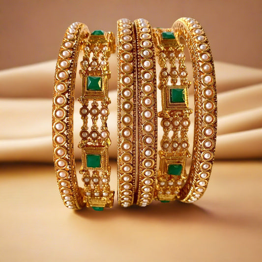 pearl bangles with green stone