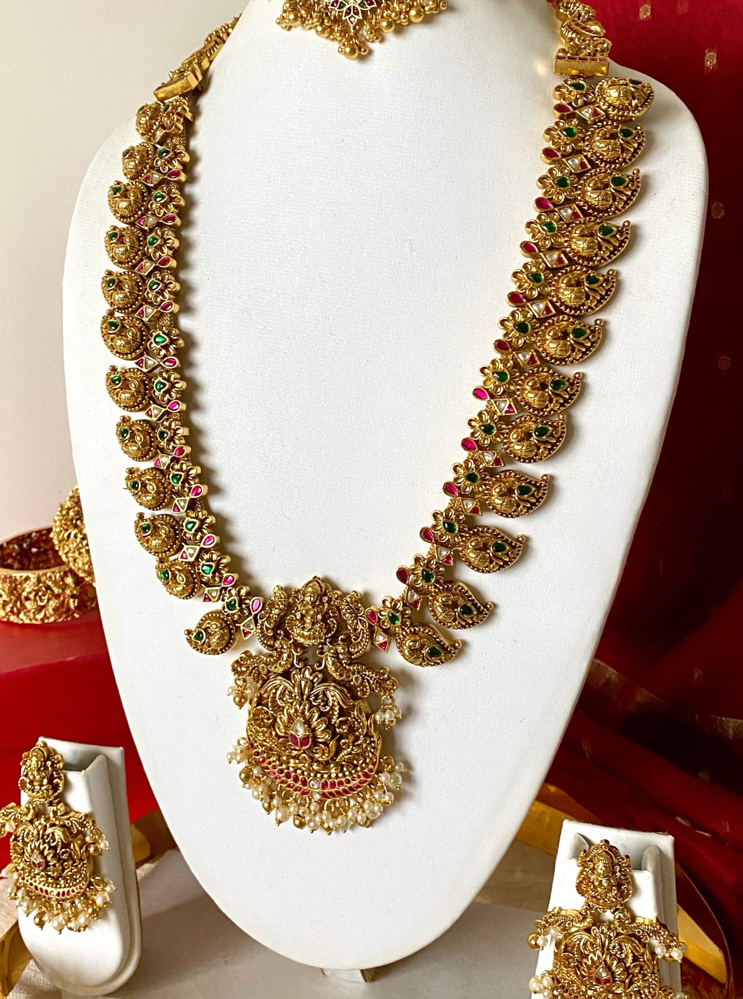 bridal antique gold mango necklace set with lakshmi pendant