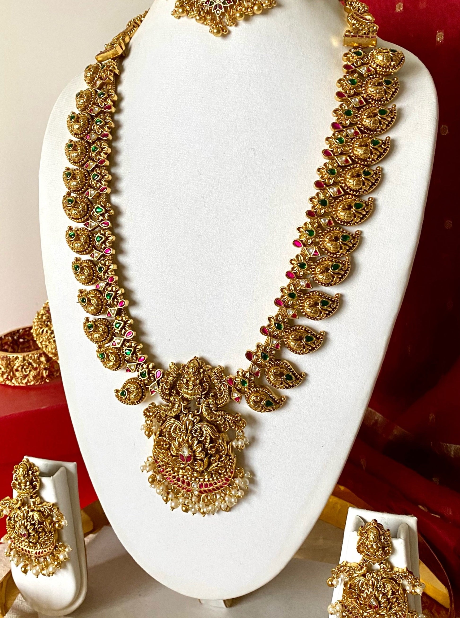 bridal antique gold mango necklace set with lakshmi pendant
