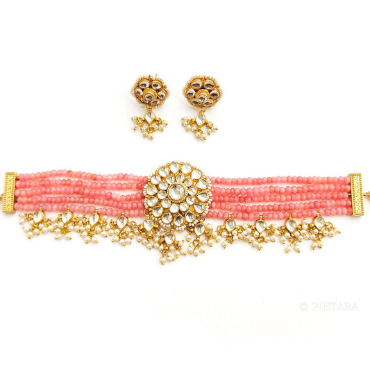 Pink choker set with kundan pendant and kundan earrings